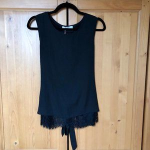 Black sleeveless top with lace underlay